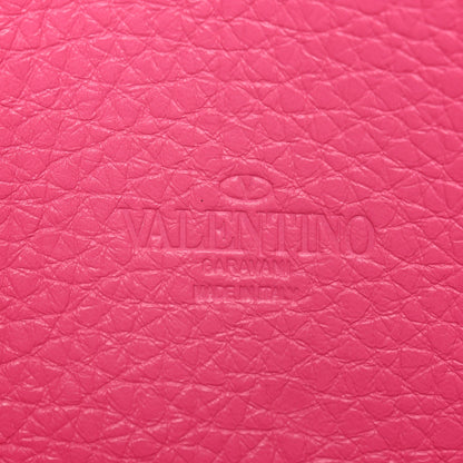 Pebbled Calfskin Medium Rockstud Flip Lock Crossbody Bag Feminine Pink