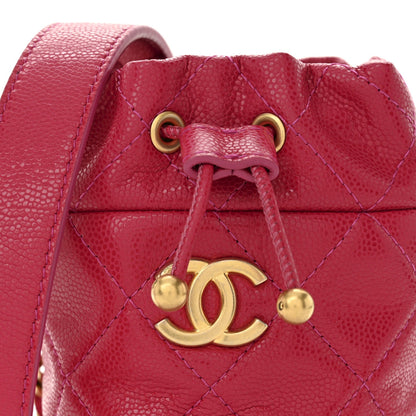 Caviar Quilted Twist Your Buttons Mini Bucket Bag Fuchsia