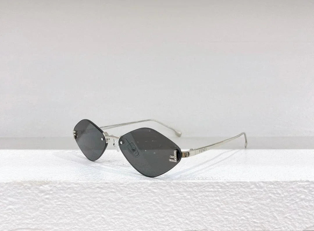 Fendi First FE6082US sunglasses in metal oval shape Women&