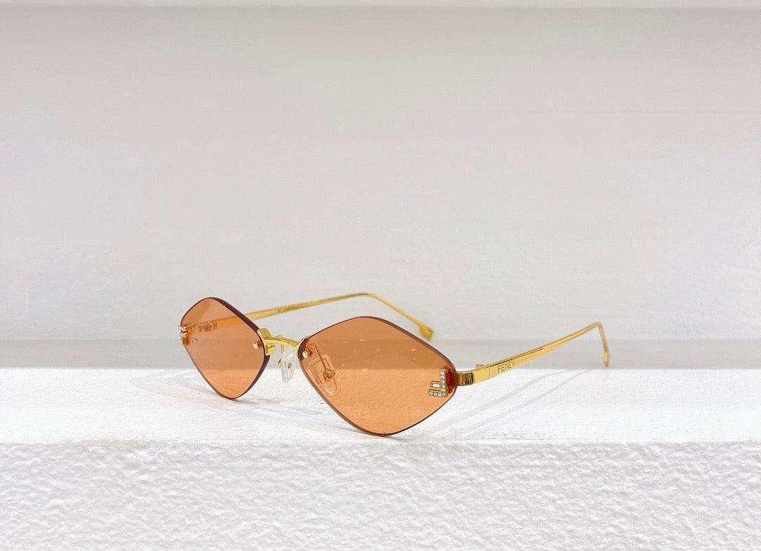 Fendi First FE6082US sunglasses in metal oval shape Women&