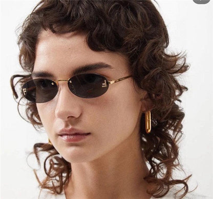 Fendi First FE4075US sunglasses in metal oval shape Women&