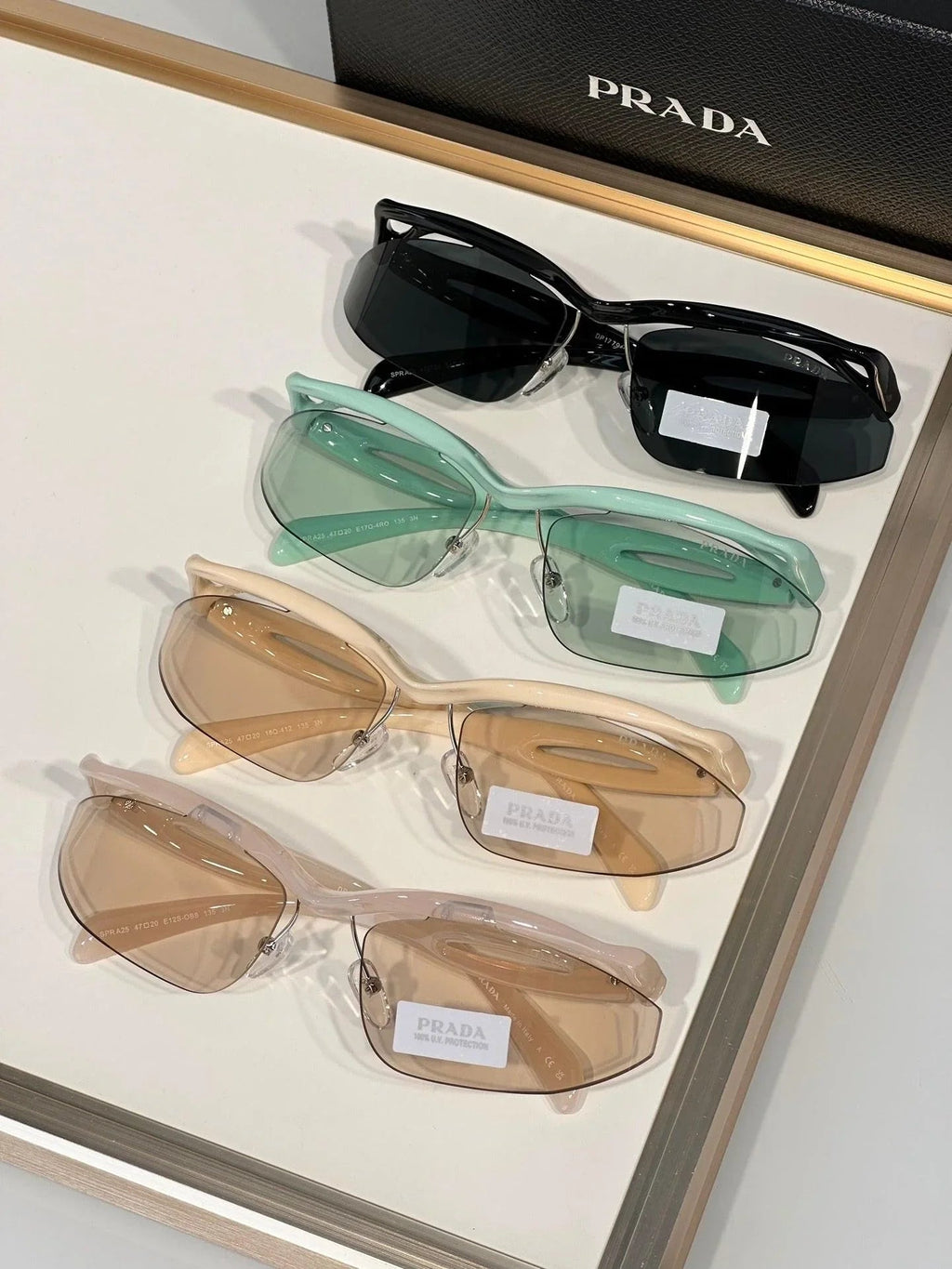 PRADA PR A25S (1AB5S0)- BLACK-PEACH-GREEN | SUNGLASSES Unisex  🟥