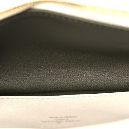 Lambskin Embossed Monogram Pochette Coussin Crossbody Creme