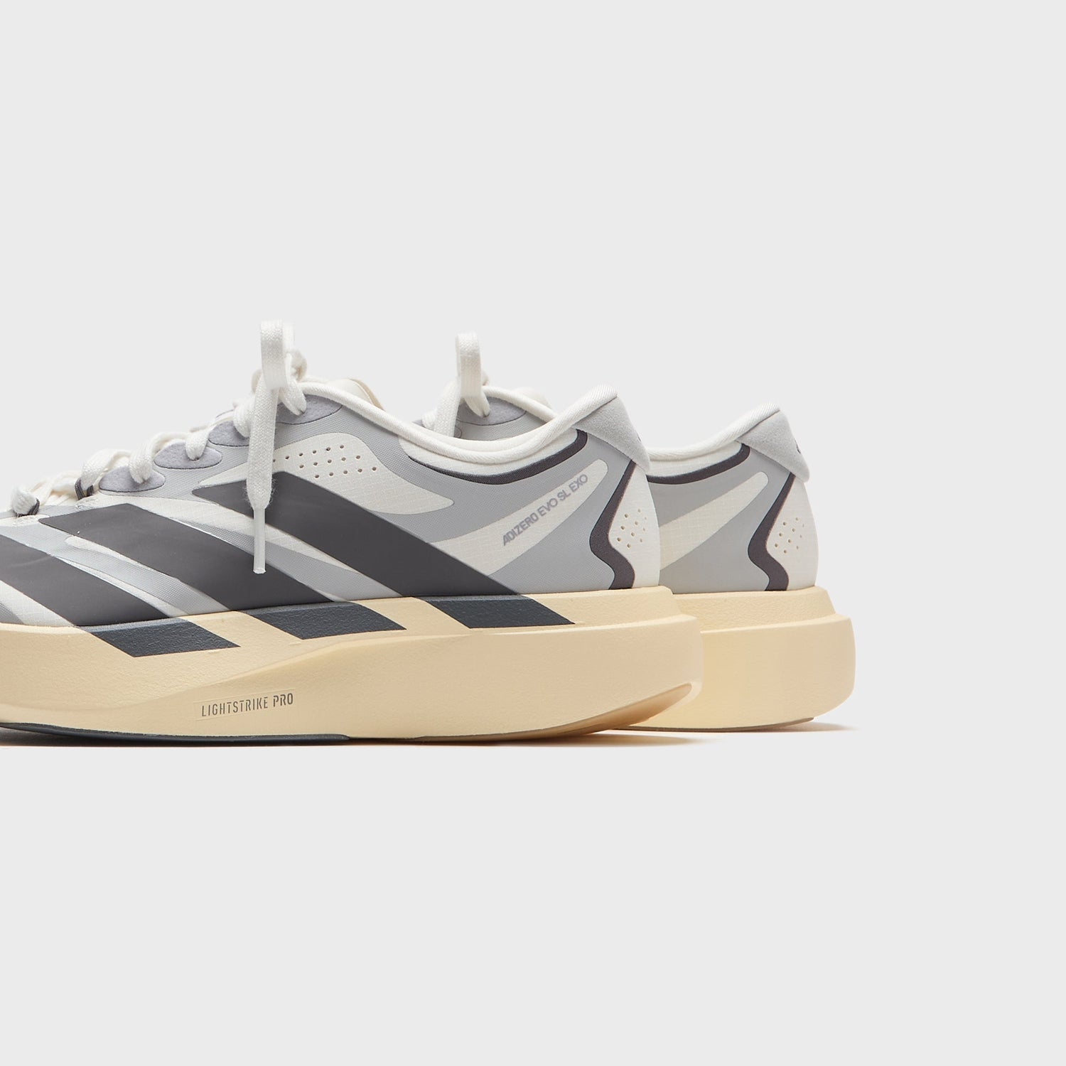 adidas Adizero Evo SL EXO - Core White / Utility Black / Grey Two