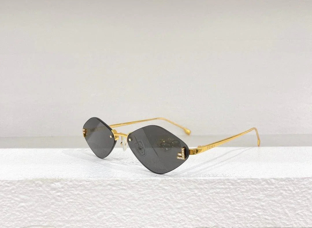 Fendi First FE6082US sunglasses in metal oval shape Women&