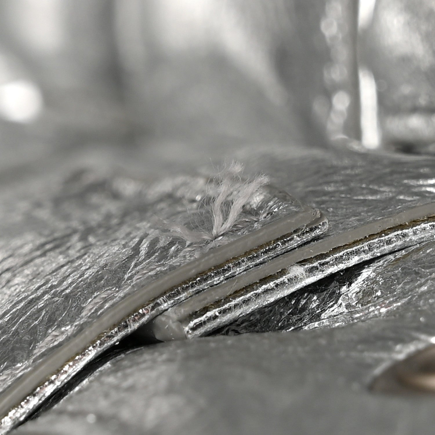 Metallic Calfskin Intrecciato Foulard Bucket Bag Silver