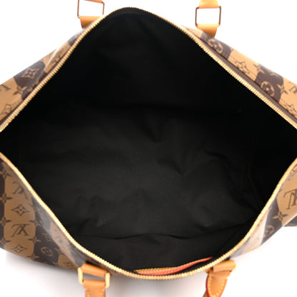 X NIGO Reverse Monogram Stripe Keepall Bandouliere 50 Brown