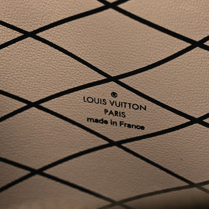 Reverse Monogram Trunk Clutch